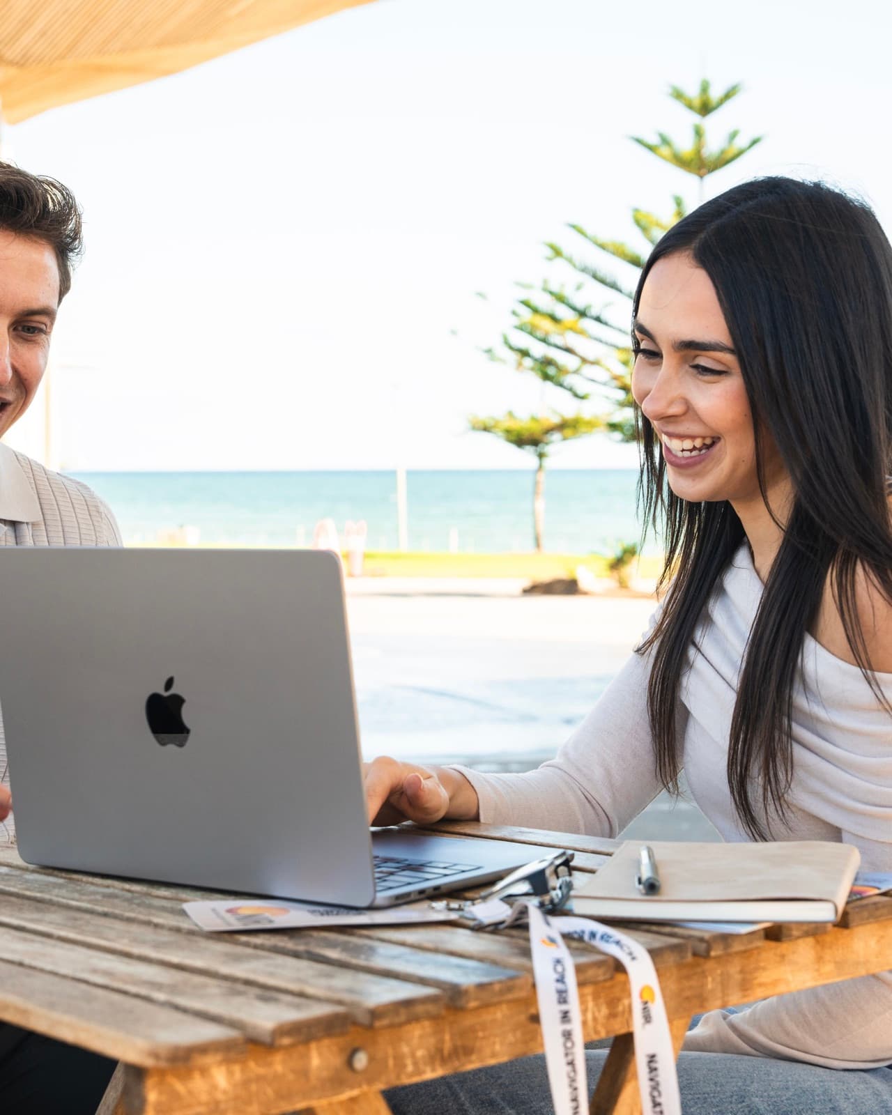 Alicia, support coordinator at Navigator In Reach, working with a participant on the Adelaide foreshore